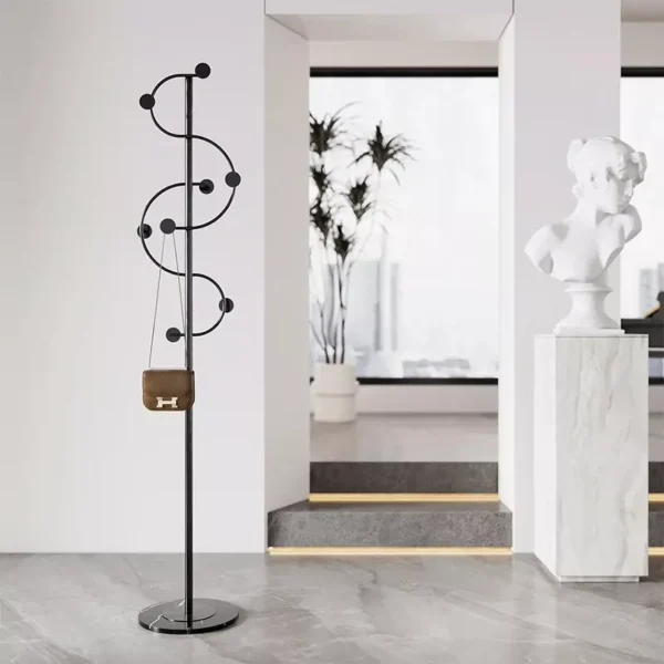 علاقة ملابس علي شكل حرف موسيقي